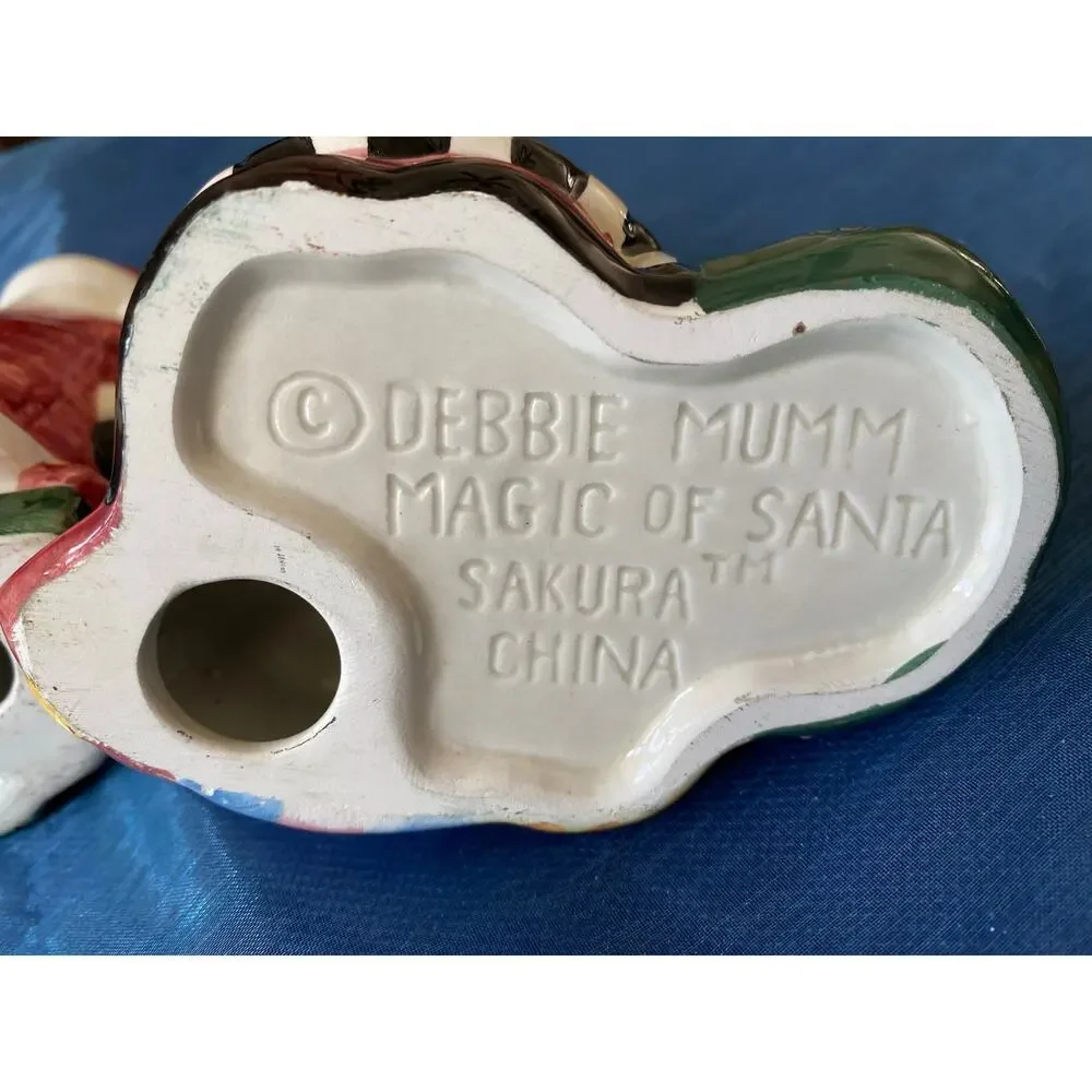2 vintage ceramic candle holder is from the 1997 Sakura 